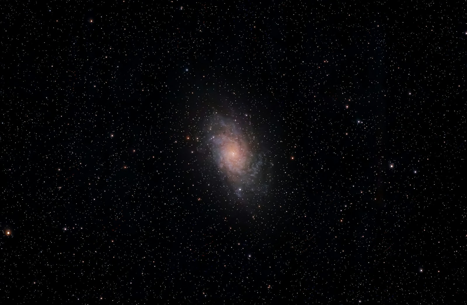 A distant galaxy surrounded by countless stars